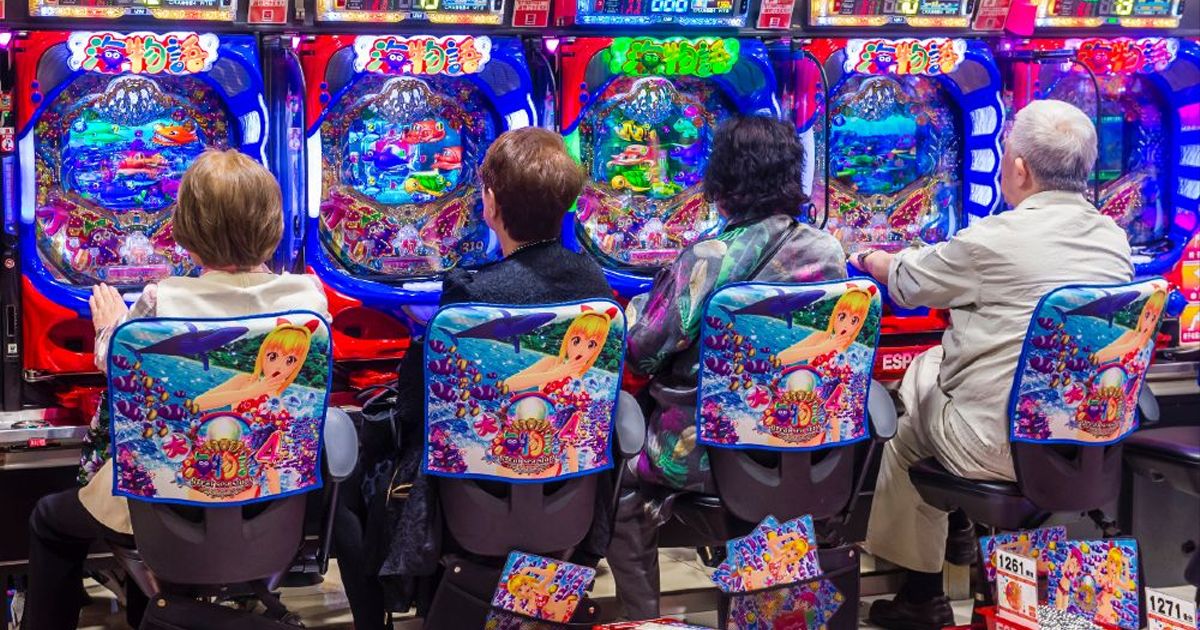 A vibrant and colorful interior of a Japanese pachinko parlor, showcasing the complex and accepted nature of this form of gambling.